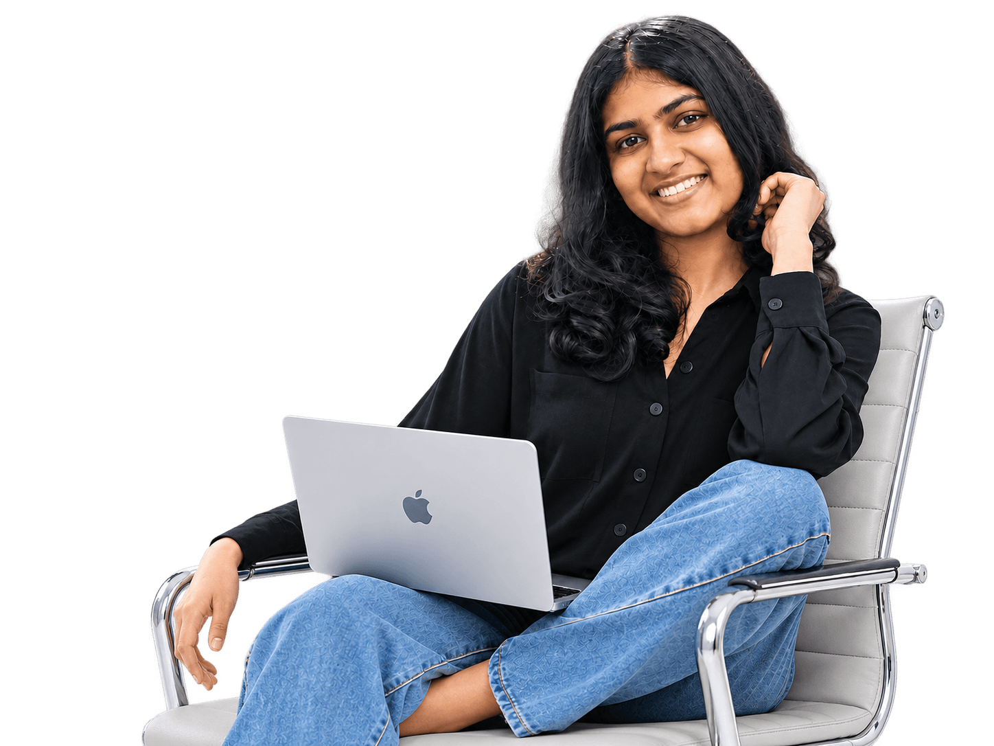 Upeksha Deshapriya smiling, seated with a laptop
